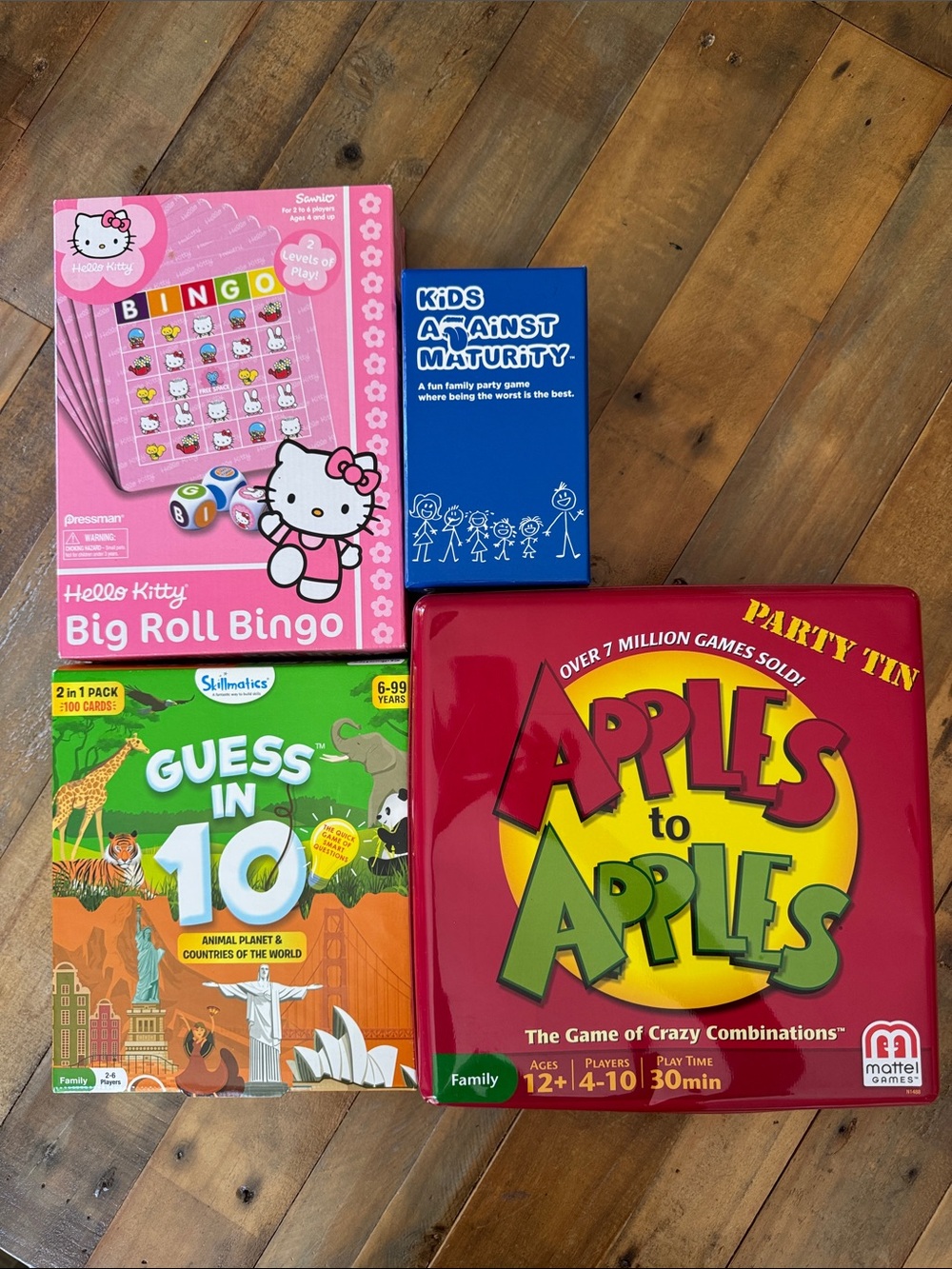Kids Against Maturity. Guess in 10. Apples to Apples. Hello Kitty Big Roll Bingo